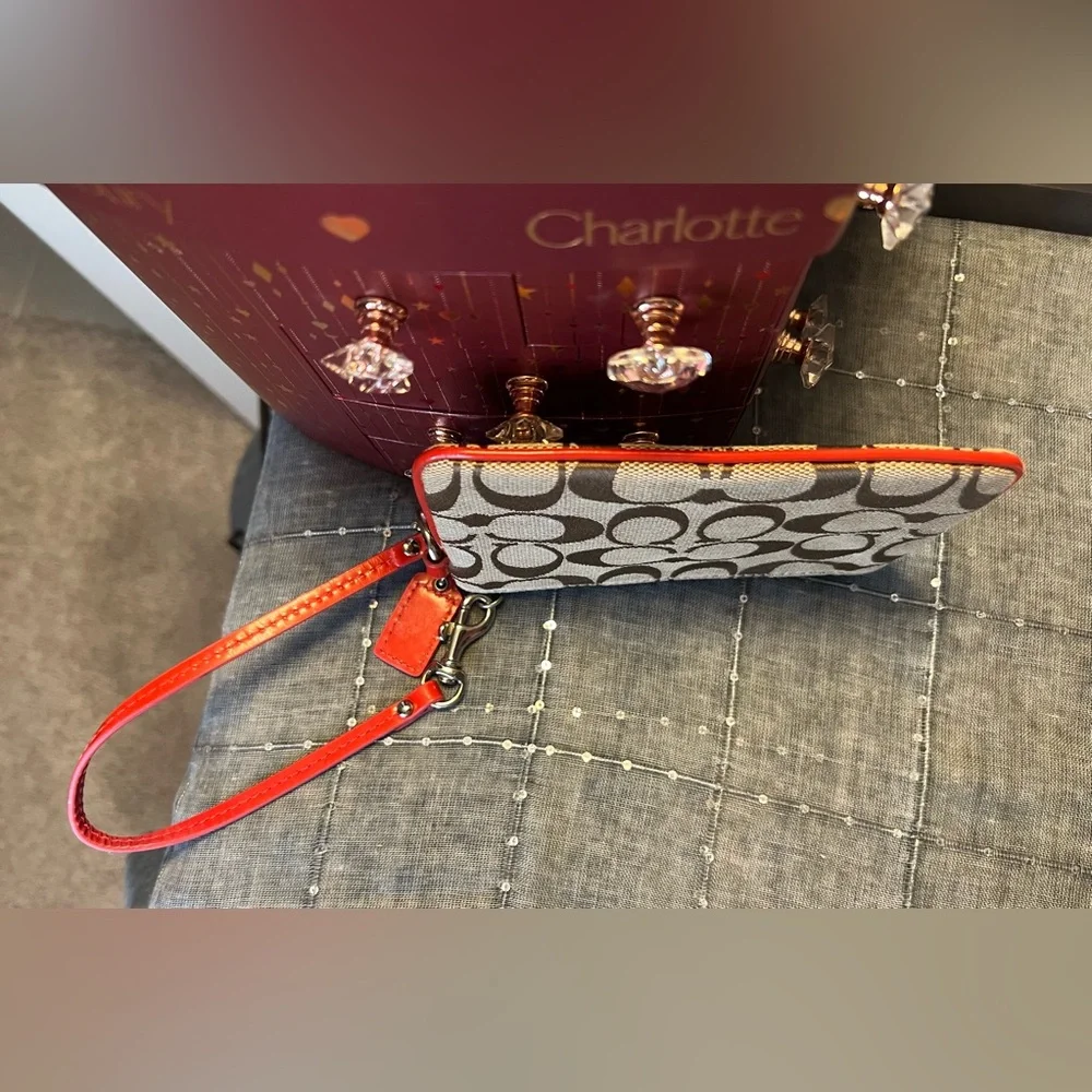 Coach Brown and Coral Wristlet with Signature C Monogram